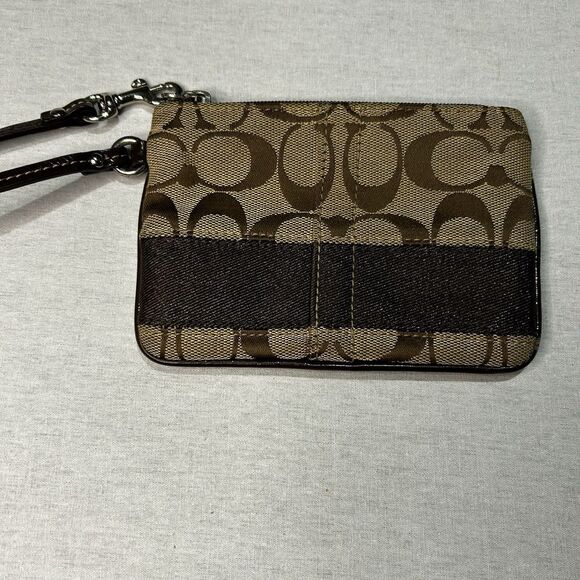 Coach Corner Zip Wristlet in signature canvas with a dark brown stripe - Picture 3 of 4